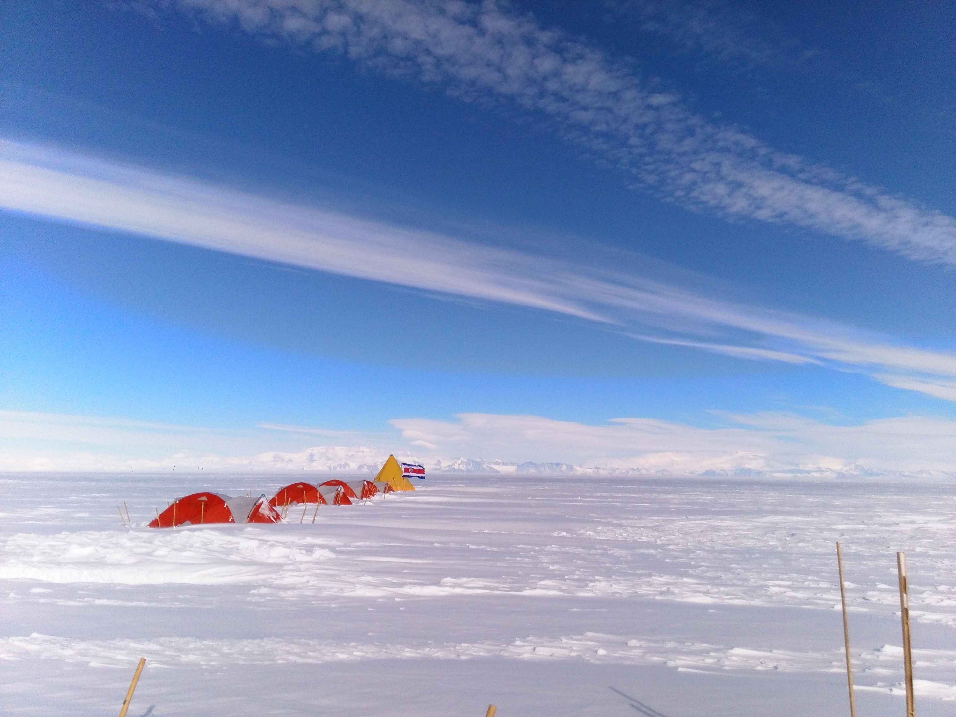 Antarctica camp with Transantarctics in the background